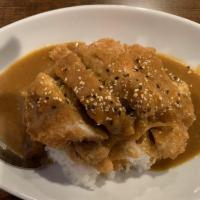 Curry Rice · Fried Chicken/Pork cutlet over rice served with Japanese curry
