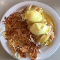 Las Vegas Bennie · A split English muffin topped with Canadian bacon, crabmeat, 2 poached eggs, and smothered w...