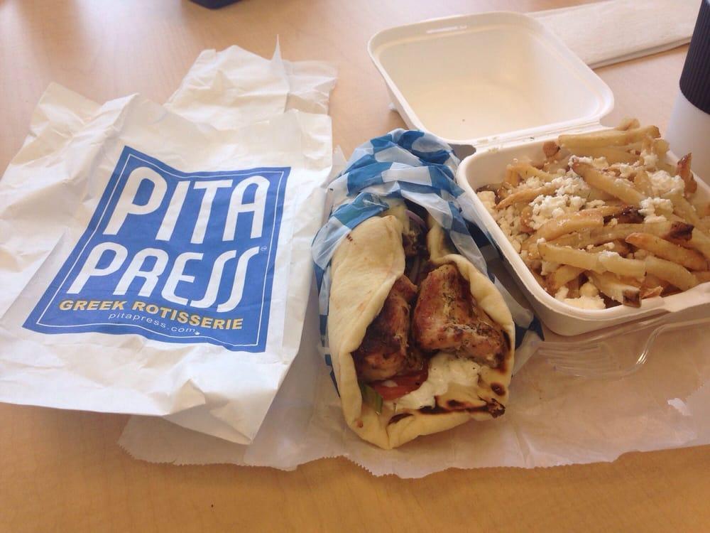 Chicken Souvlaki Pita · Grilled marinated chicken breast cubes. Served with Lettuce, Tomatoes and Onions