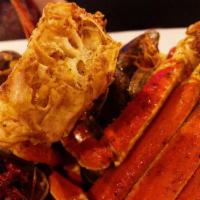 Seafood Platter · Snow crab, whole shrimp, crawfish, mussels, clams, corns, and potatoes.