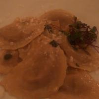 Pumpkin Ravioli · Fresh ravioli pasta filled with pumpkin and sauteed with butter and sage.