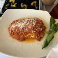 Lasagna · Freshly baked with mozzarella, ricotta, besciamella, Parmigiano Reggiano and meat sauce.