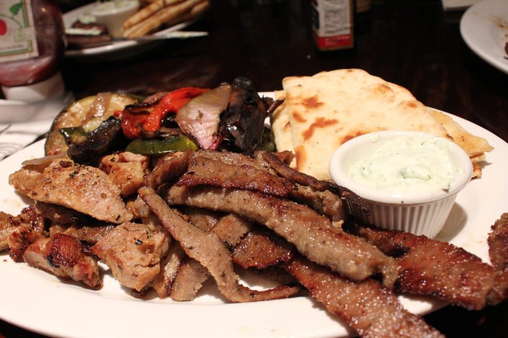 Combination Platter · Beef and pork platter with small Greek salad, tzatziki, pita bread and 1 side of your choice.