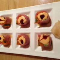 8 Piece Saddle River Roll · Craw fish, crunch powder inside, spicy crab meat, spicy tuna and wasabi tobiko outside.