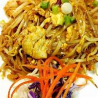 Pad Thai · Rice noodles stir-fried with meat, egg, green onions, bean sprouts, fish sauce, vinegar and ...