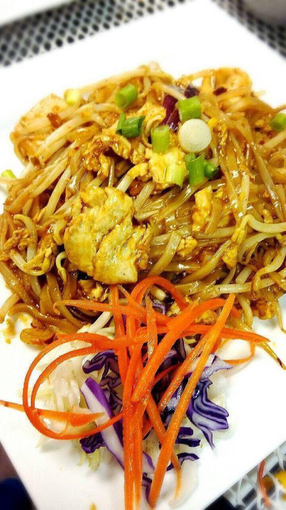 Pad Thai · Rice noodles stir-fried with meat, egg, green onions, bean sprouts, fish sauce, vinegar and sugar. Comes with lime and peanuts.