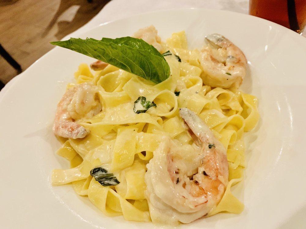 Fettuccine Alfredo · Egg noodles tossed and our cream Parmesan Alfredo sauce with fresh basil. 