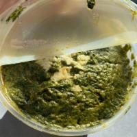 Palak Paneer · Creamy spinach cooked with homemade Indian cheese.