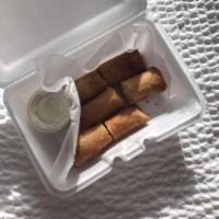 Buffalo Chicken Rolls · Crispy spring rolls with Buffalo chicken, served with blue cheese.