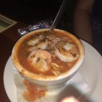Jambalaya · Smoked sausage, shrimp, and chicken smothered in a delicious red roux and poured over a moun...