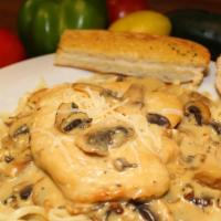 Chicken Marsala · A delicious, classic dish. Lightly coated chicken breasts cutlets, braised with Marsala wine...