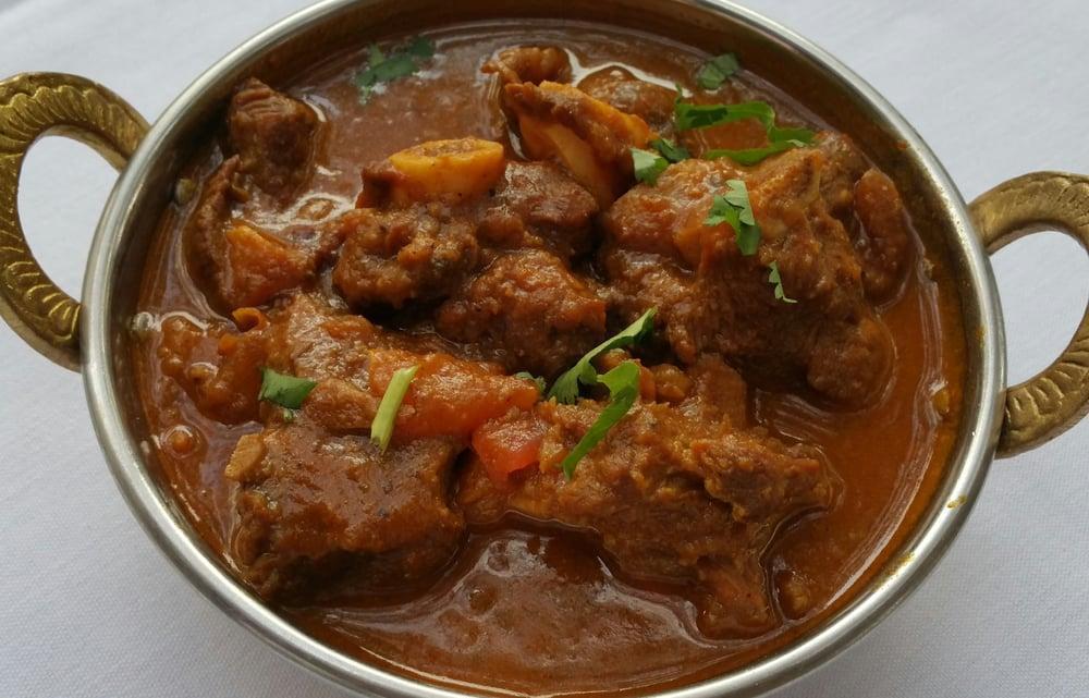 Goat Curry · Goat meat with bone specially cooked in onion, tomato, and traditional spices from Nepal.