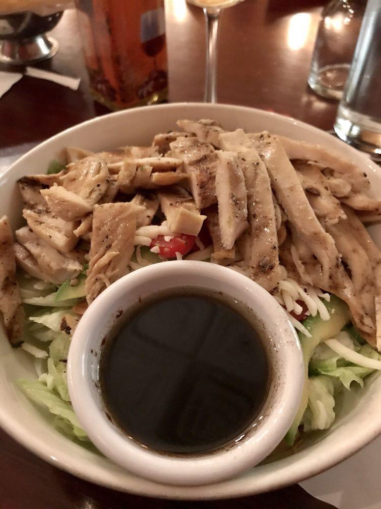 Avocado Grilled Chicken Salad · Chopped iceberg lettuce, shredded mozzarella, grilled chicken, avocado, toasted almonds, and cherry tomato with balsamic vinaigrette.