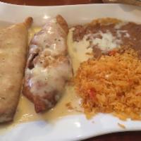 Chimichangas · 2 crispy fried flour tortillas filled with shredded beef or chicken, covered with own cheese...