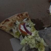 Greek Pizza · Mozzarella cheese and gyro meat topped with Greek salad, finished with tzatziki sauce and fe...