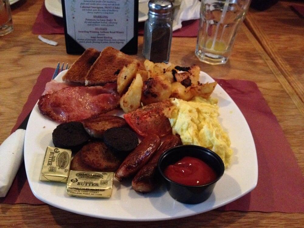 Irish Breakfast · two irish pork sausages, irish bacon, black & white pudding, two eggs cooked to order, baked beans, french fries, toast and grilled tomato