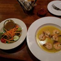 Scampi · Wild caught shrimp in a lemon, garlic and white wine sauce served over linguine.
