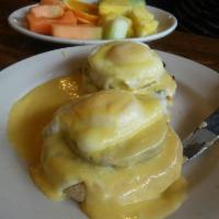 Eggs Sardou · Poached eggs over artichoke bottoms and topped with our homemade hollandaise sauce.