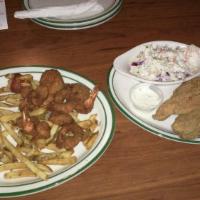 Floyd's Seafood Platter · 2 oysters, 2 catfish, 2 shrimp, 1 crab stuffed shrimp, & 1 crab cake served with fries & hus...