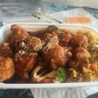 Sesame Chicken · Chunks of boneless fried chicken sauteed over a high flame and blended with sesame sauce.