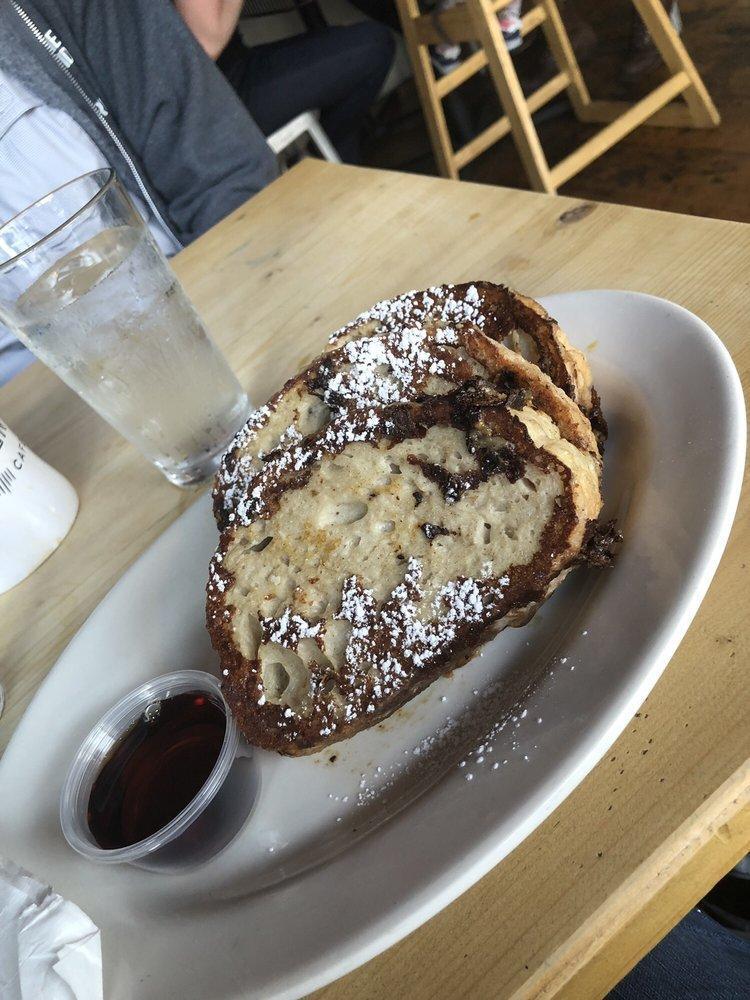 French Toast · House made cinnamon bread topped with vanilla creme fraiche and your choice of apple, banana walnut, or blueberry sauteed in honey butter.
