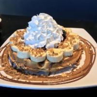 Naughty Waffle · Strawberries, bananas, blueberries, almond butter, granola, whipped cream.