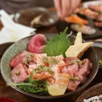 Deluxe Toro Bowl Sashimi Combo · 10 pieces. Salmon bellym hamachi belly, o-toro, white fish toro.