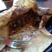 Veggie Burrito · Potato, carrot, and mushroom. Choice of beans, rice, pico de gallo, and tortilla or try it n...