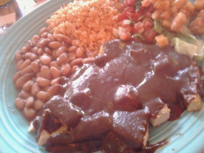 Tofu Mole · Our unique vegan mole with organic grilled tofu; served with rice, beans, jicama salad, and tortillas.