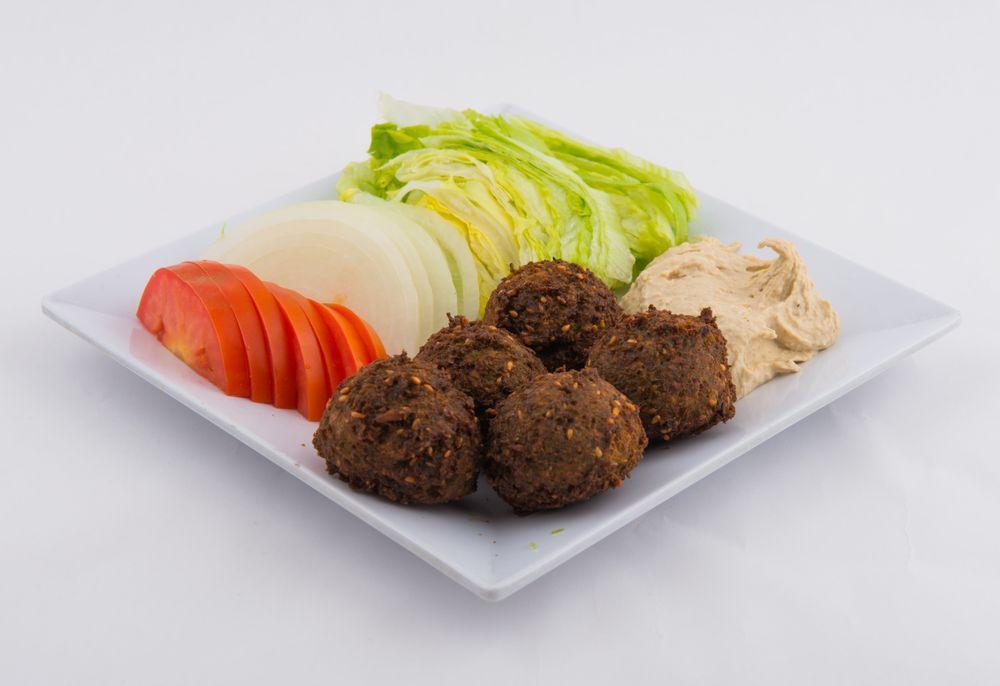 Falafel Plate · 5 pieces. Chickpeas, parsley, onions, and garlic mashed and lightly deep-fried. Served with hummus.