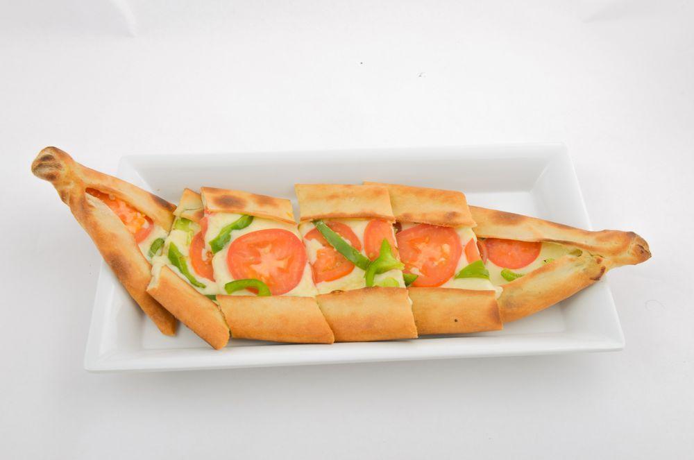 Cheese Pide · A thick dough crust With mozzarella cheese.