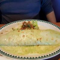 Pollo Asado Burrito · Charbroiled chicken breast with Spanish rice and re fried beans wrapped in a flour tortilla....