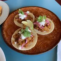 Achiote Cauliflower Tacos · A Trio of Mayan spiced, oven-roasted cauliflower topped with warm pineapple chutney, pickled...