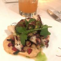 Grilled Octopus · Panzanella salad and olive vinaigrette.