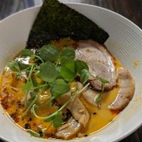 Tantan Men · Flavored with sesame based chopped pork chashu, spinach, chilli oil, peanut, garlic and gree...