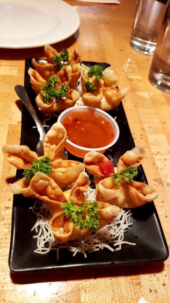 Crab Rangoon Appetizer · Crispy wonton filled with Dungeness crab meat, cream cheese, water chestnut, onion and carrot. Served with sweet and sour plum sauce.