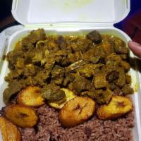 Curry Goat · Goat meat seasoned with fresh herbs and spices, slow cooked
with hot peppers and curry that...