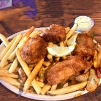Fish & Chips · Crispy white fish or shrimp served with French fries and Housemade coleslaw.