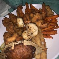 The Seafood Kitchen Combination · Fresh mayport shrimp, gulf select oysters, cold water scallops, fresh fish and homemade stuf...
