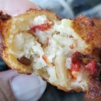 Conch Fritters · Mama Shaw's legendary recipe.