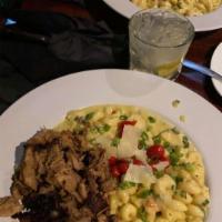 Spicy Mac · Jalapeno puree, jack cheese, onion, roast peppers and cavatappi noodles.