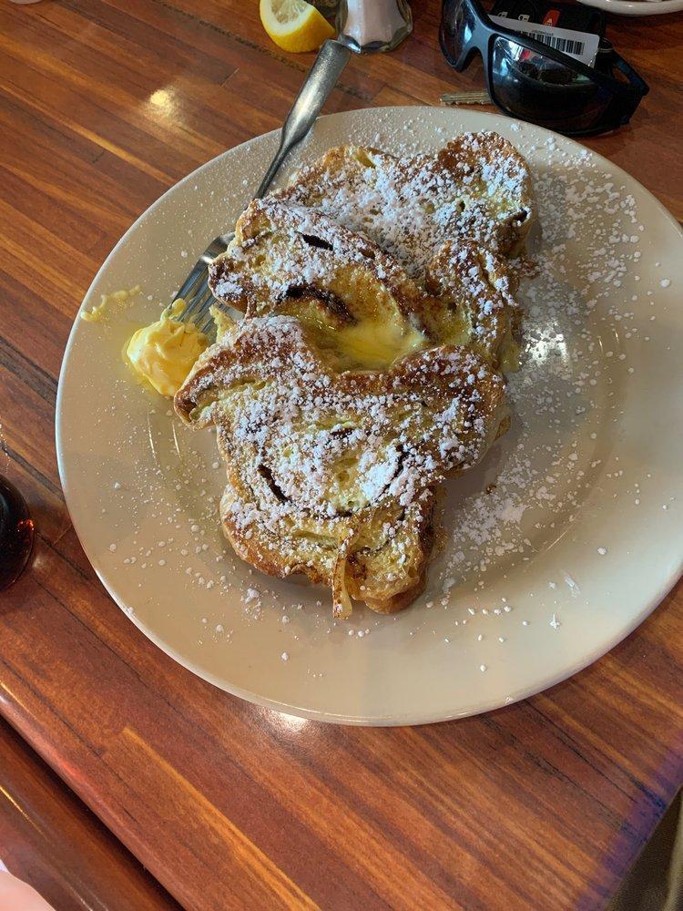 French Toast · 3 big slices of sweet cinnamon bread dipped in our homemade batter and grilled to perfection, honey butter on top with a dash of powder sugar.