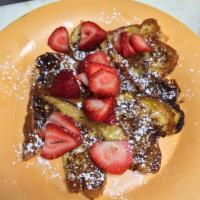French Toast · Made with Challah bread, cinnamon and vanilla.