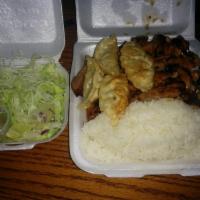 Chicken Teriyaki · Chicken stir-fried with teriyaki sauce. Served with rice and salad.