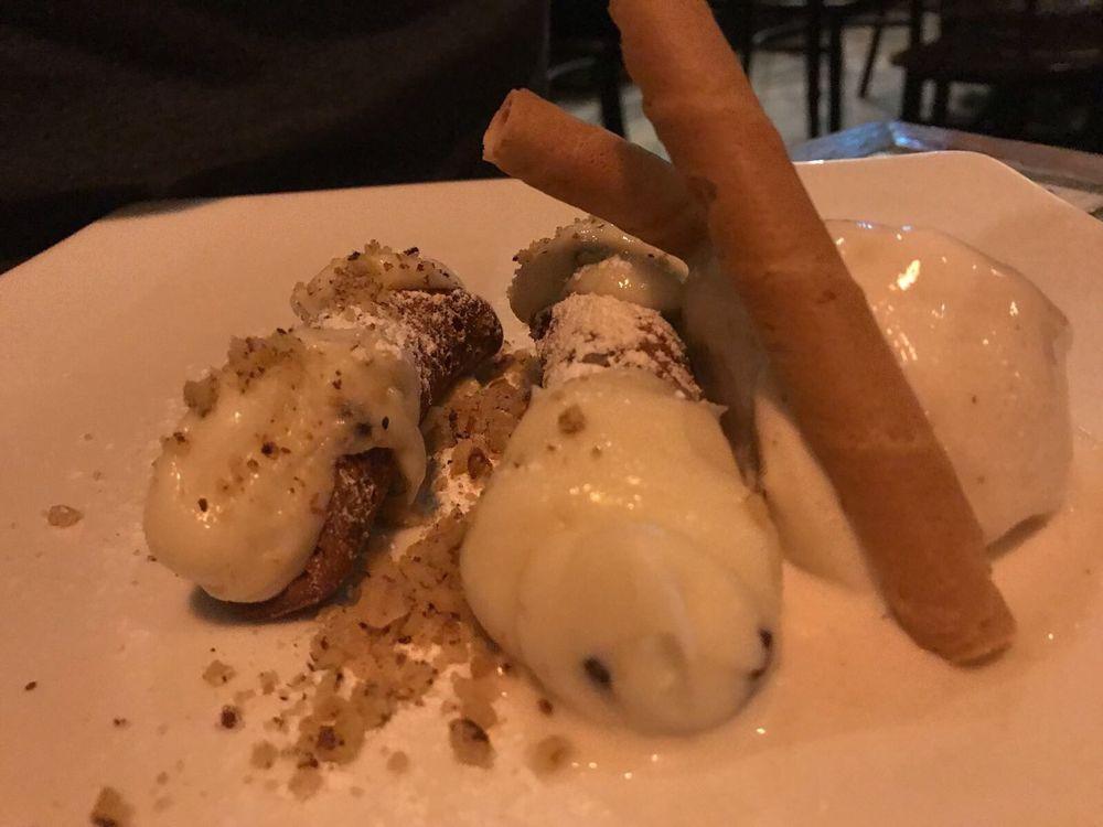 Cannoli · Pastry shell filled with a mix of ricotta cheese, chocolate and pistachio.