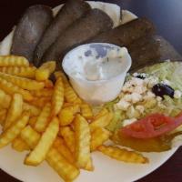 Gyro Platter · Sliced beef gyro over homemade pita bread with tzatziki sauce with a side of Greek salad and...