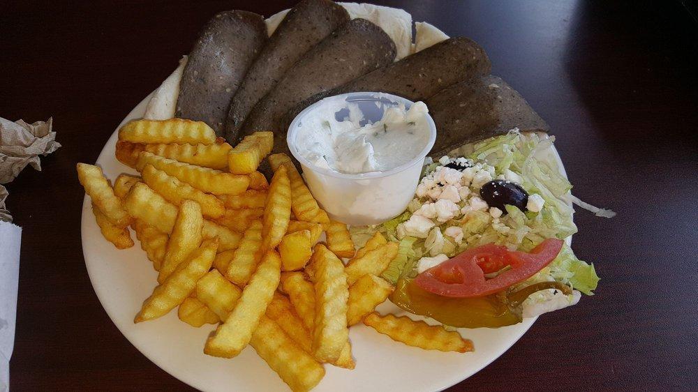 Gyro Platter · Sliced beef gyro over homemade pita bread with tzatziki sauce with a side of Greek salad and small fires. Add extra meat for an additional charge.