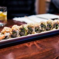 Super Crunch Roll · Shrimp tempura and cucumber inside topped with sushi shrimp and avocados, sprinkled tempura ...