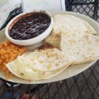 Quesadillas · A large grilled flour tortilla filled with Jack cheese, mild pico de gallo and seasoned grou...