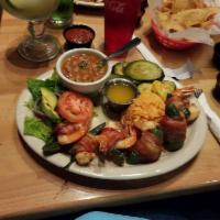 Cabo Shrimp · 6 piece butterflied jalapeno shrimp wrapped in bacon, cooked in lemon garlic butter and serv...